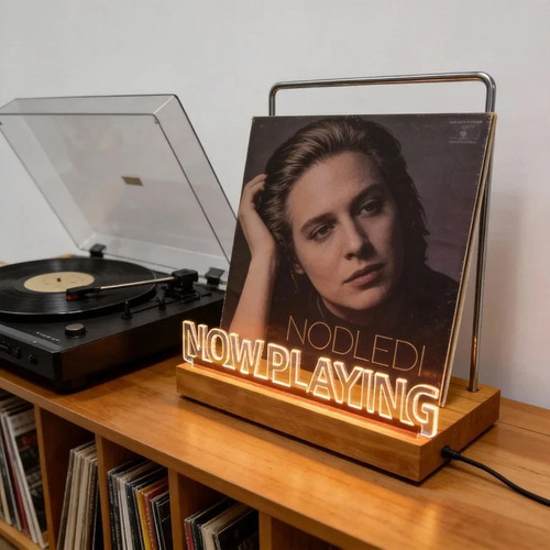 Now playing vinyl record stand - record,