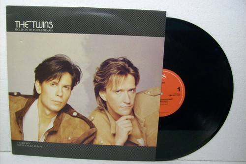 The twins hold on - 12",